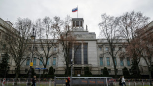 Germany summons Russian envoy, expels alleged spy handler