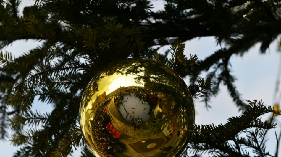 Dow, S&P 500 end at records amid talk of Santa rally