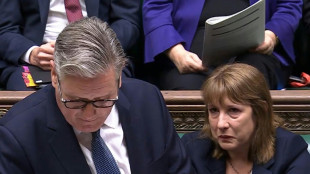 UK govt backs finance minister after tears in parliament