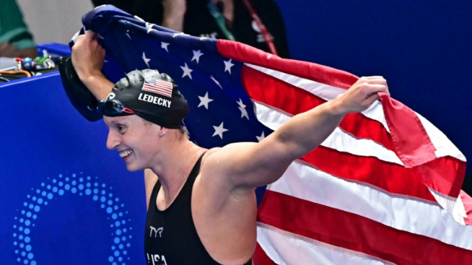 Ledecky wins 22nd world title as Popovici savours 'scary' gold  
