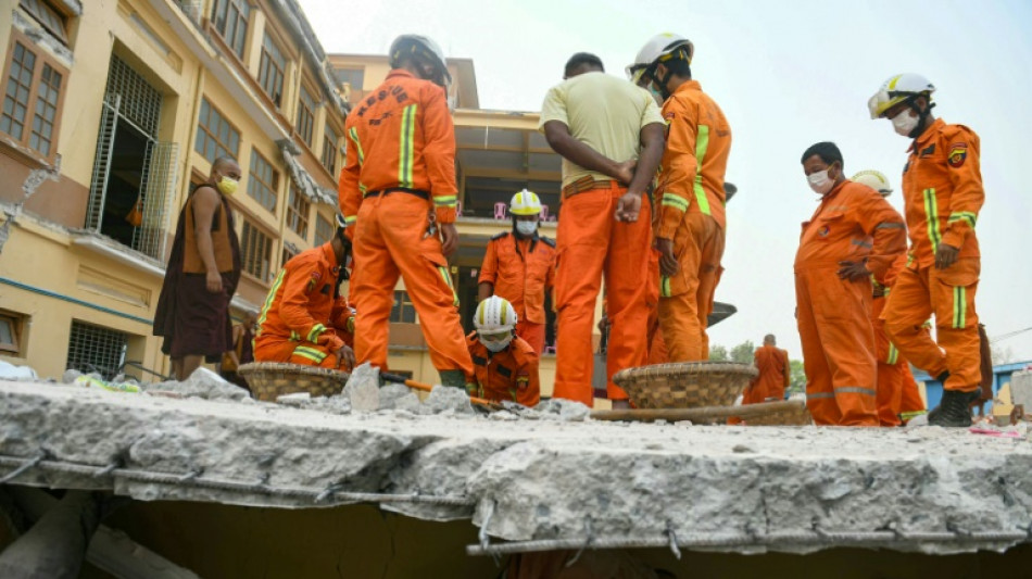 Tears, prayers in search for monks trapped by Myanmar quake