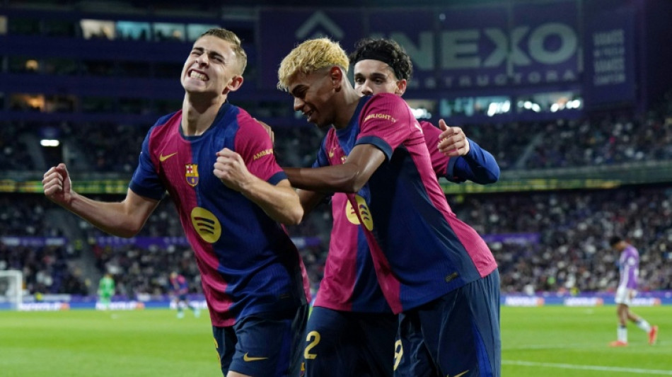 Barca stay on Liga title track with Valladolid comeback