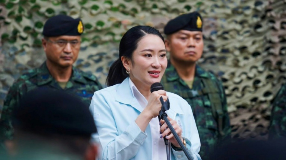 Embattled Thai PM reshuffles cabinet as crisis rages