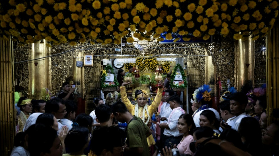 In war-split Myanmar 'spirit consorts' commune across divide