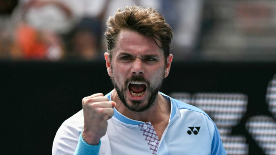 Warhorse Wawrinka stays alive at farewell Australian Open 