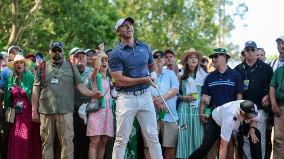 McIlroy leads by four as Masters back-nine battle begins