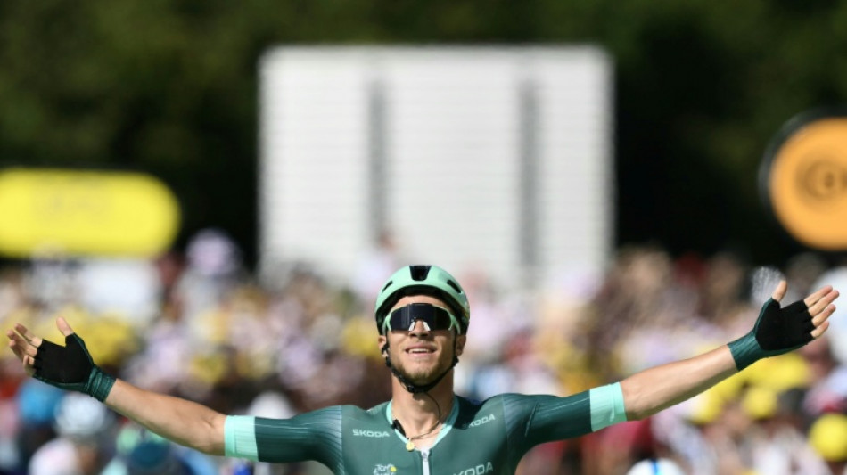 Milan wins baking Tour de France eighth stage in mass sprint