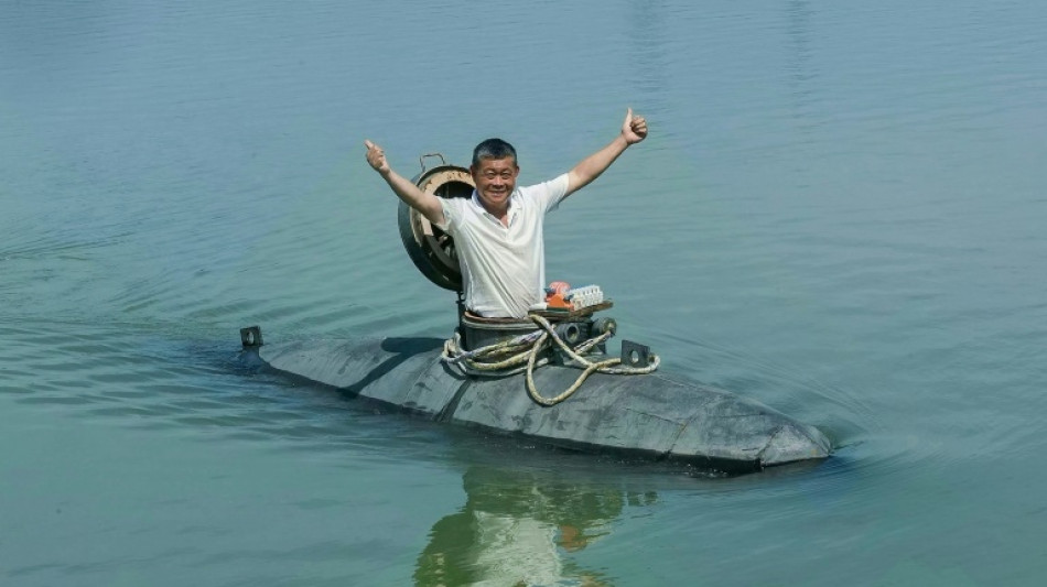 Chinese farmer makes splash with homemade submarine
