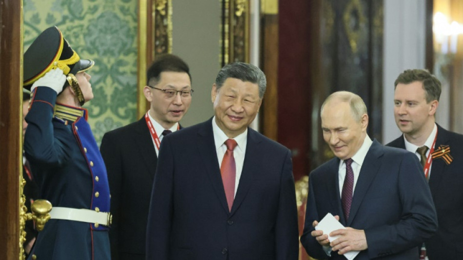 Putin y Xi muestran su sinton&iacute;a en el Kremlin, Ucrania denuncia la violaci&oacute;n de la tregua