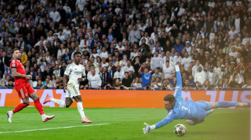 Com mais um gol de Vini, Real Madrid volta a vencer Benfica (2-1) e vai &agrave;s oitavas da Champions