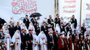 Mass wedding brings hope amid destruction in Gaza