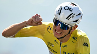 Pogacar extends Tour de France lead with uphill time-trial win