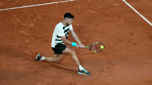 Alcaraz fights into French Open last 16 as Swiatek, Sabalenka progress
