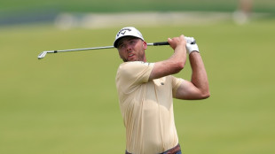 Burns fires 65 to grab US Open lead as big names stumble