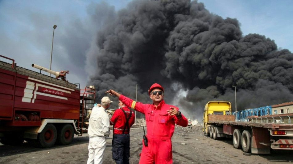 Fire rages after major blast at Iran port kills 14, injures 750