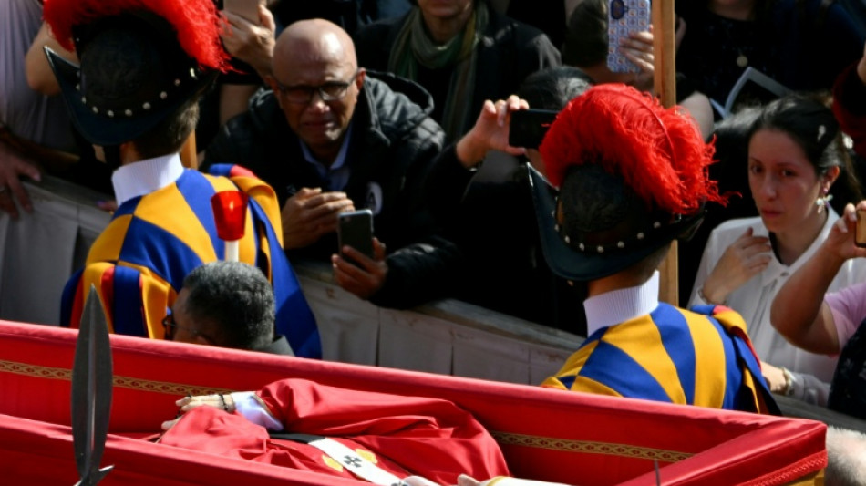 Crowds bid farewell to Pope Francis in first day of lying in state