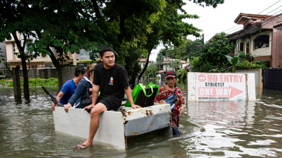 Philippines flooding displaces thousands as new storm threatens