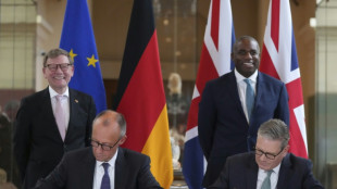 Britain seeks German help against people smuggling gangs on landmark Merz visit