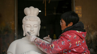 China's Buddha artisans carve out a living from dying trade