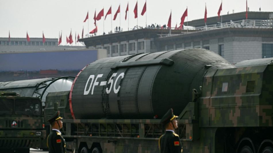 Beijing shows off drones, missiles and lasers in military parade